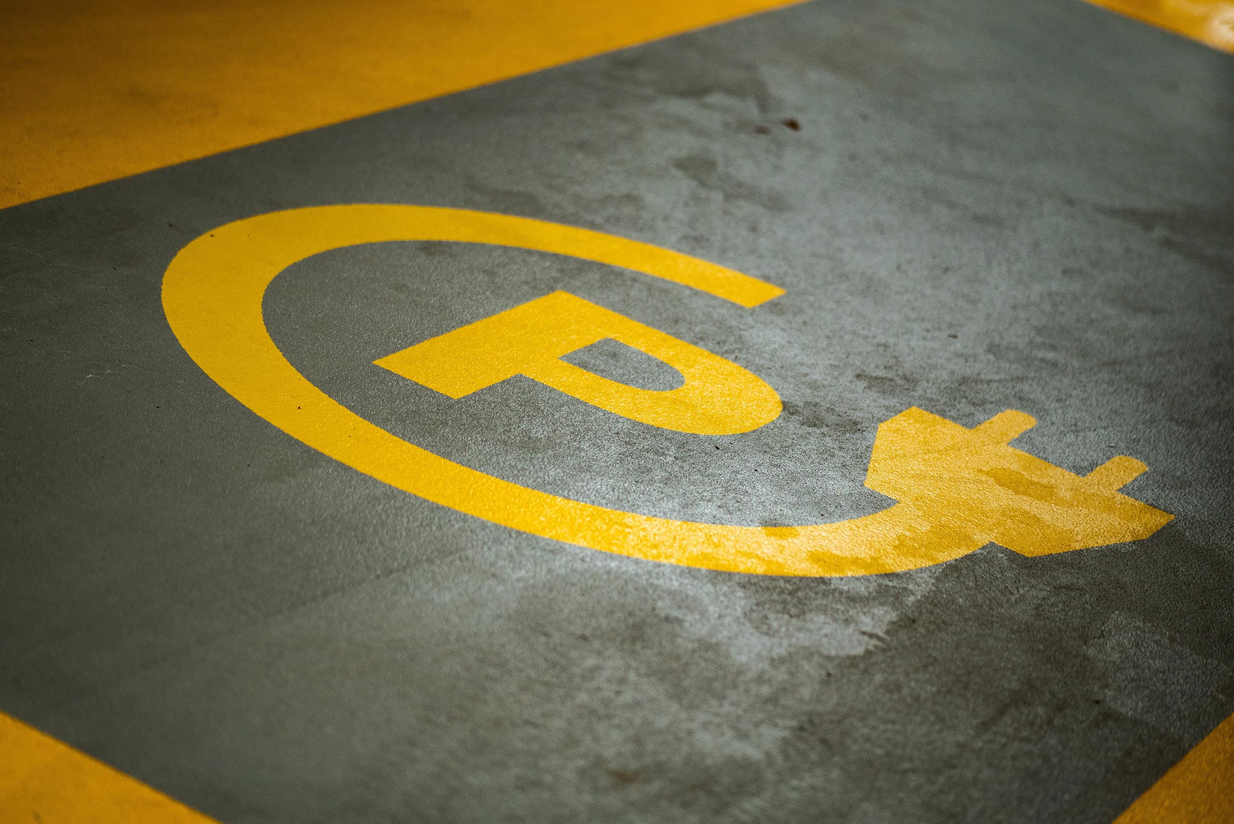 Parking spot for electric vehicles by Michael Fousert on Unsplash